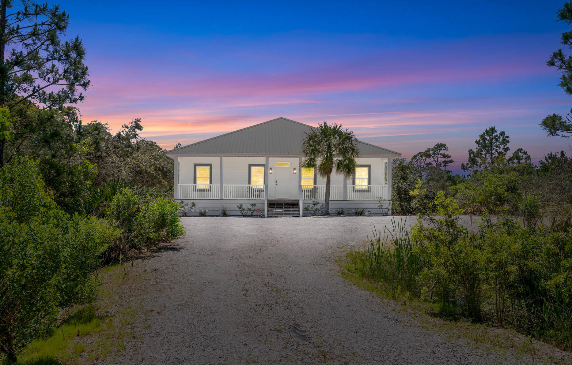 Photo of Paradise Palms property exterior at twilight in Gulf Shores, Alabama.